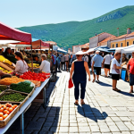 **

*   **Prompt:** A bustling open-air market in Montenegro, showcasing local produce and crafts. In the background, the stunning Adriatic coast is visible. People from diverse backgrounds are interacting, buying and selling goods. The scene conveys a sense of economic opportunity and tourism potential.

**